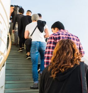 People Standing in a queue